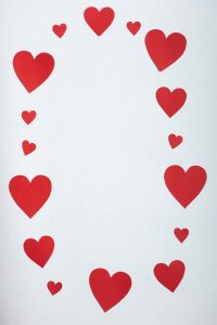 composition of red paper hearts